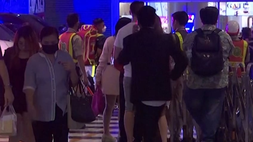 teen opens fire with handgun at bangkok mall leaving 3 dead