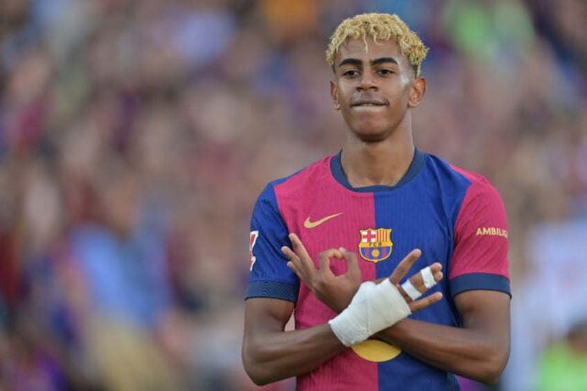 Barcelona's Spanish forward Lamine Yamal has penned a new deal with the Catalan giants aft