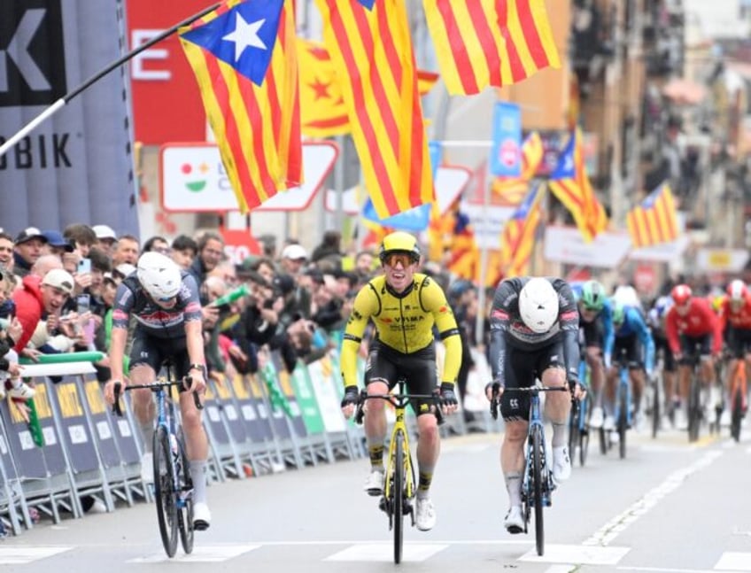 Team Visma's British rider Matthew Brennan (C) snatched victory in stage one of the Tour o
