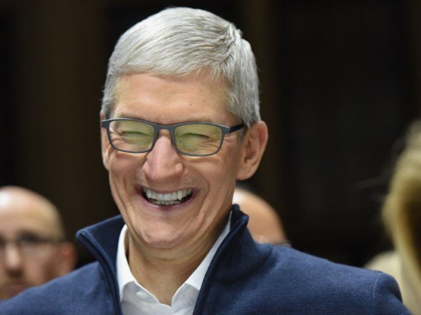 Tim Cook CEO of Apple laughing