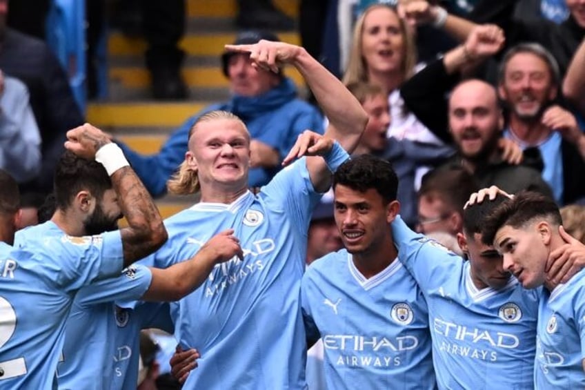 ten man man city show silk and steel to extend premier league lead