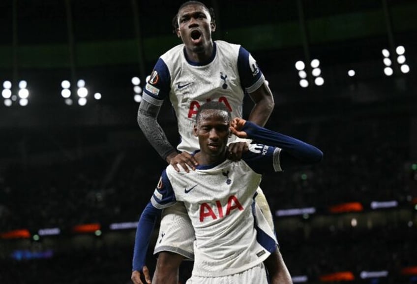 Tottenham's Pape Sarr (bottom) celebrates scoring against Qarabag