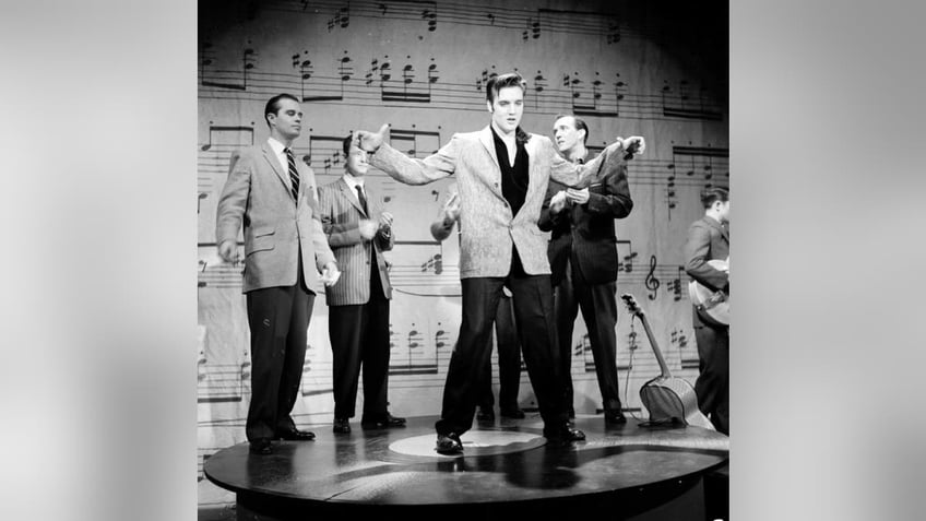 Elvis Presley performs on stage on the Ed Sullivan Show on January 6, 1957, in New York City. (Photo by Steve Oroz/Michael Ochs Archives/Getty Images)