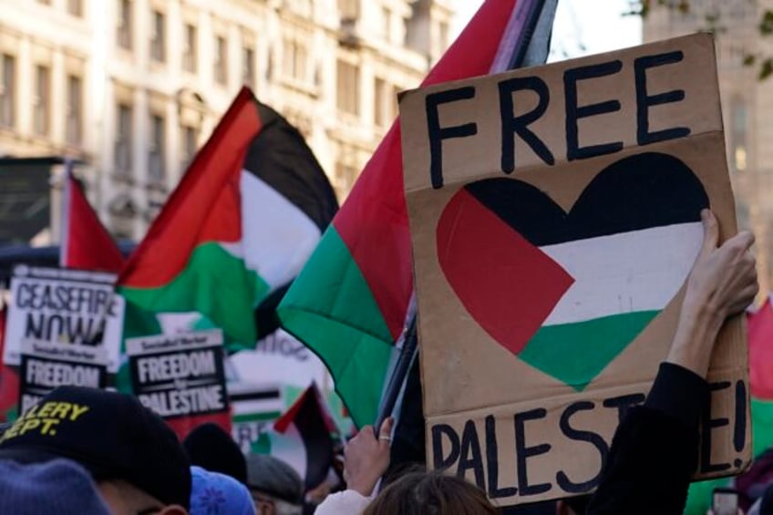 tens of thousands march in london calling for a permanent cease fire in gaza