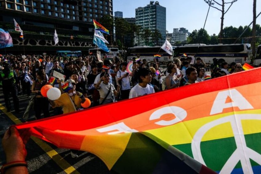 Tens of thousands of LGBTQ South Koreans and their supporters gather in central Seoul for