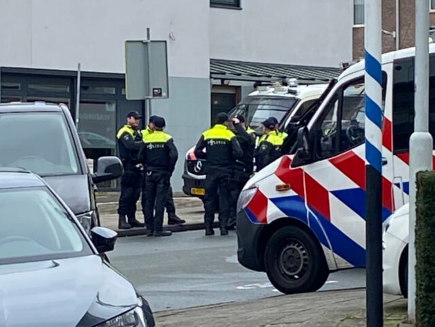 Police gather in Eden, Netherlands, Saturday, March 30, 2024. Heavily armed police have co