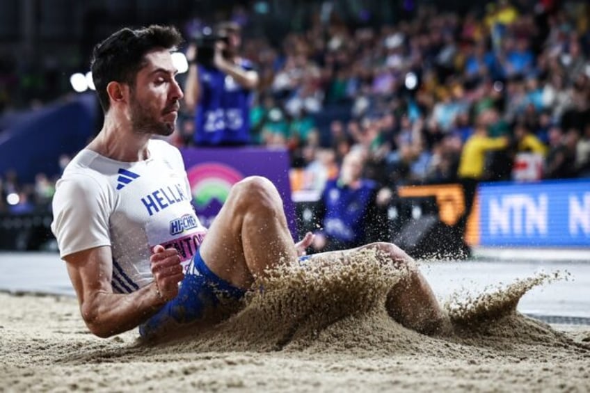 Greece's Miltiadis Tentoglou competes in the men's long jump final at the world indoors