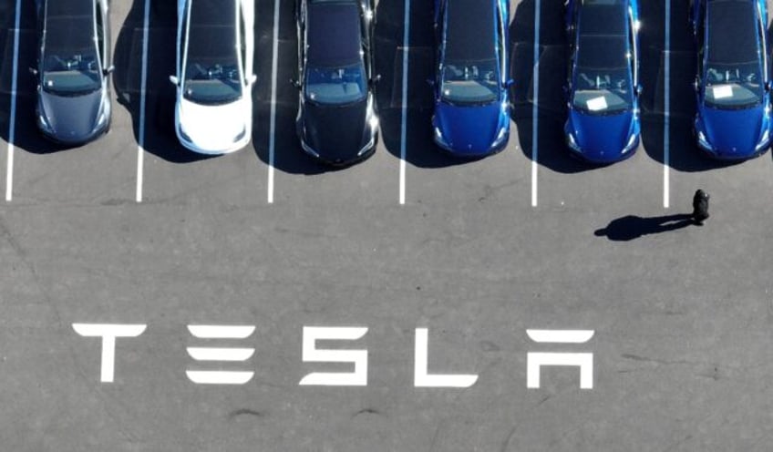 tesla earnings rise to 27 bn on increased sales lower prices