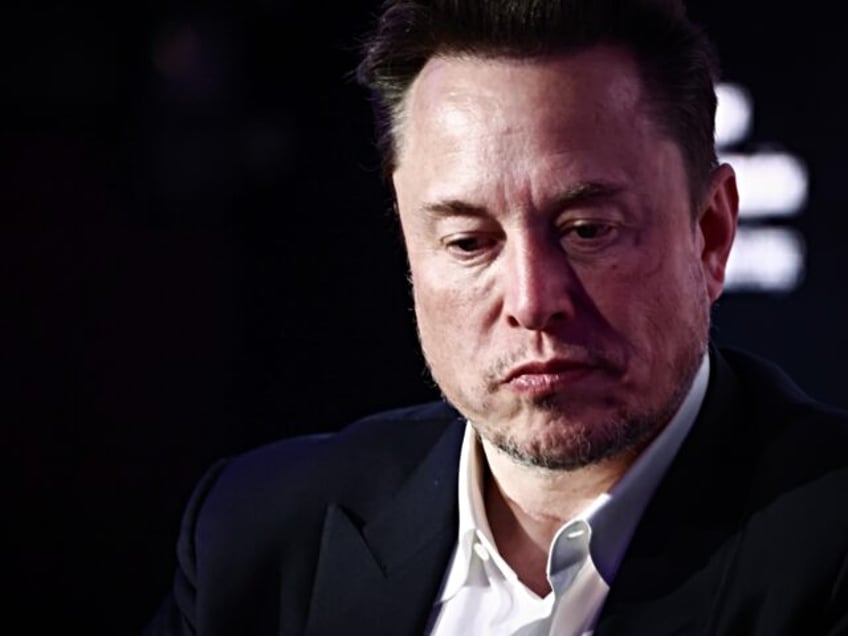 Elon Musk, owner of Tesla and the X (formerly Twitter) platform, attends a symposium on fi