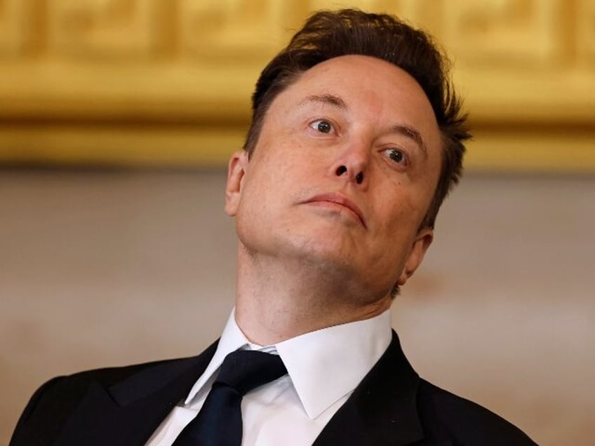 Elon Musk watches Tesla execs walk out the door