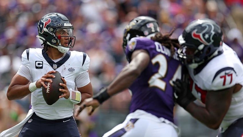 texans cj stroud joins brett favre in exclusive club with odd play on first drive