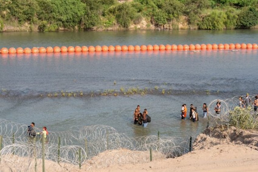 texas anti migrant river buoys illegal us envoy says