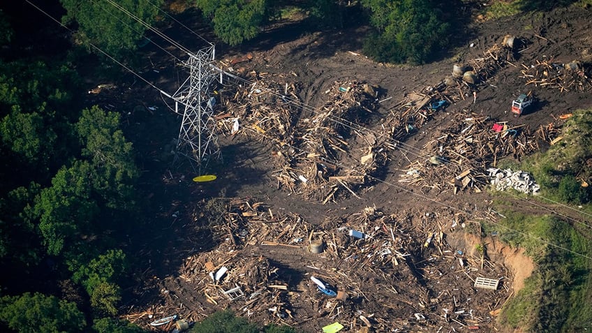 aerial photo shows damage from flash floods