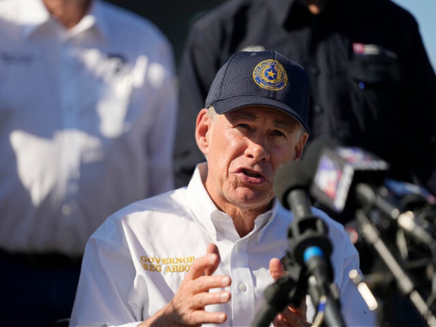 Texas Gov. Greg Abbott is joined by fellow governors during a news conference along the Ri