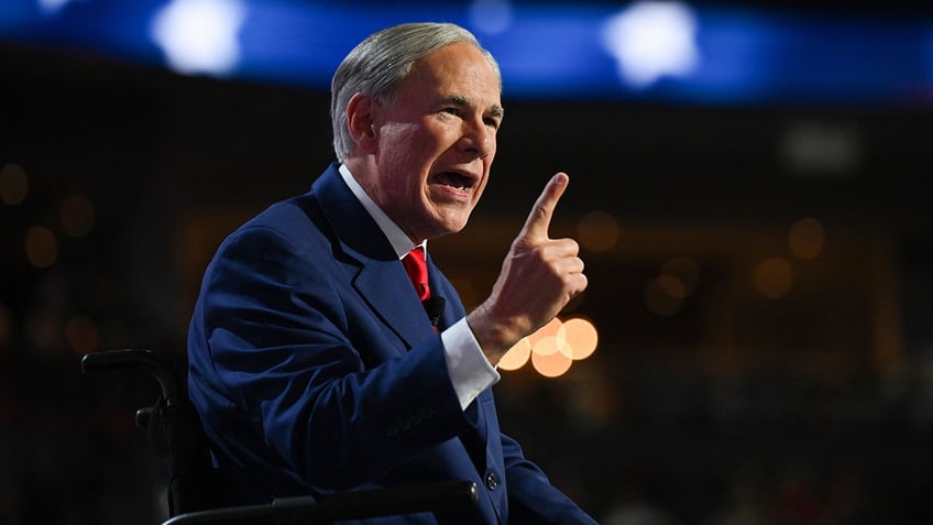 Greg Abbott speaks at podium