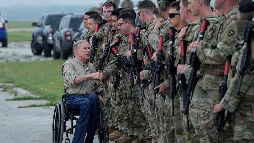 Abbott greets national guard