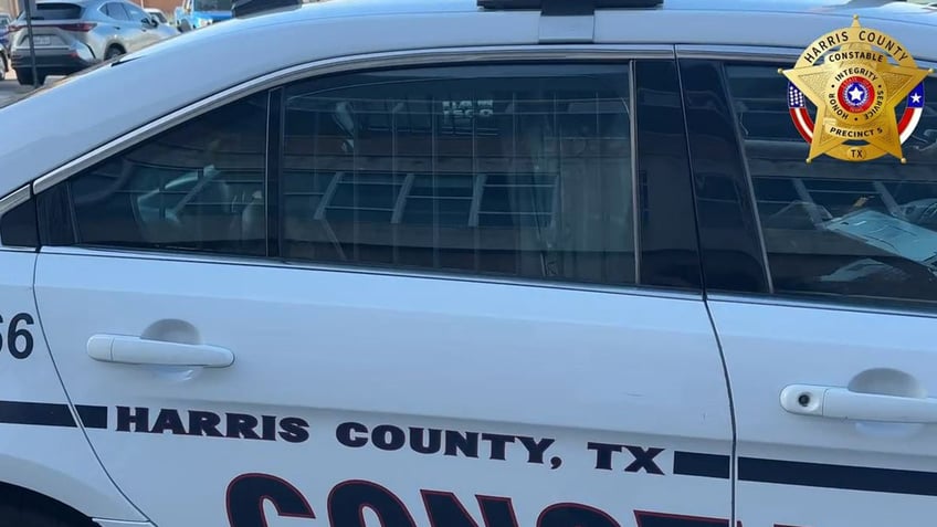 Williams in Harris County constable car