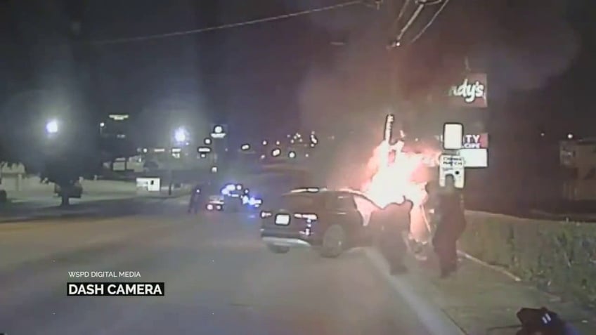 texas police pull unconscious man from burning car in heroic rescue video shows