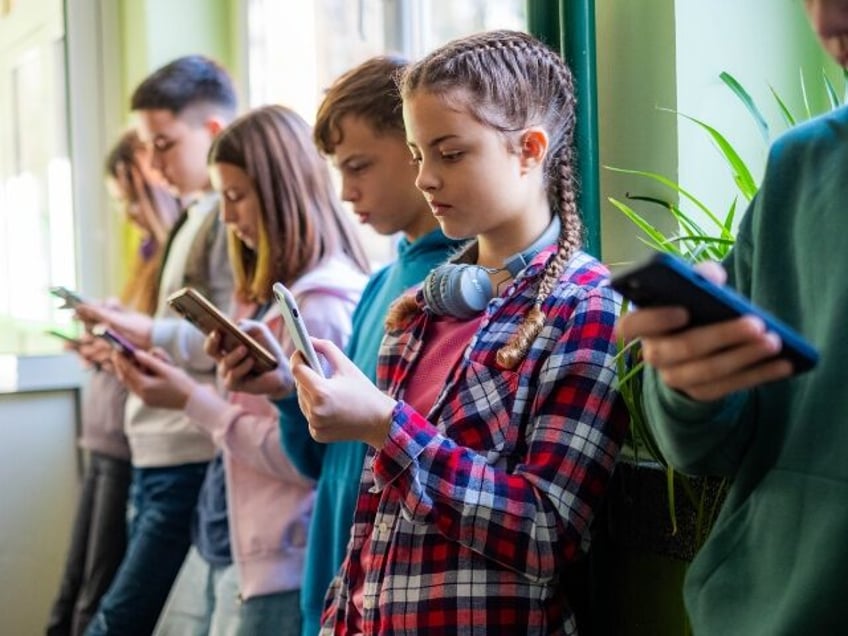 Kids glued to their smartphones