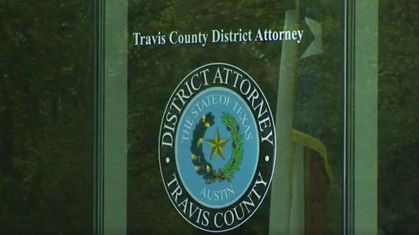 Travis county DA door