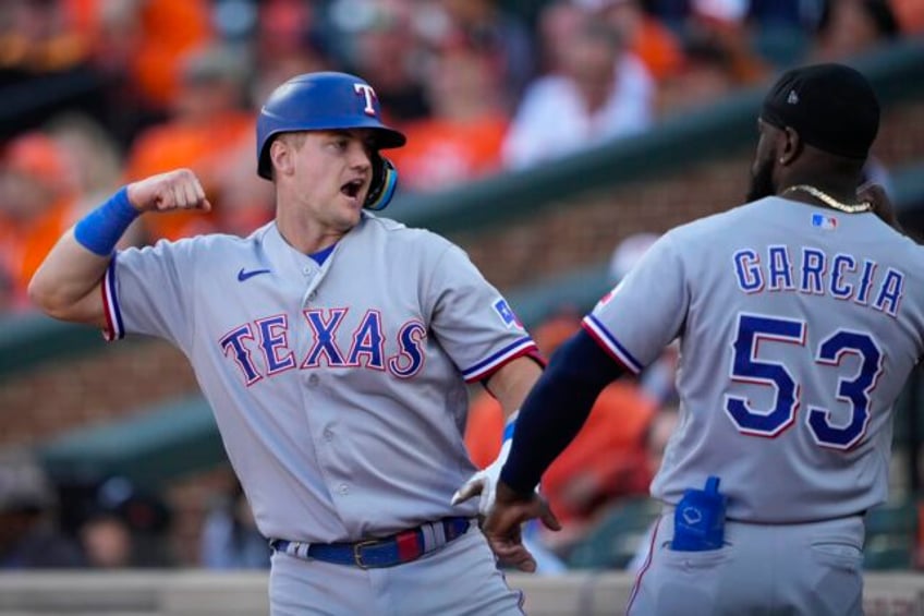 texas shaky bullpen escapes late as rangers hold off orioles 3 2 to open alds