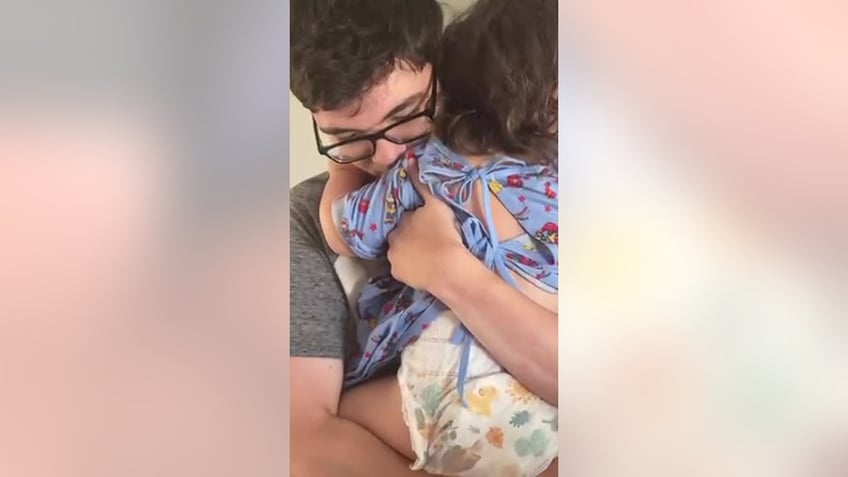 texas siblings reunite in emotional video after brother saves 2 year old sister from drowning