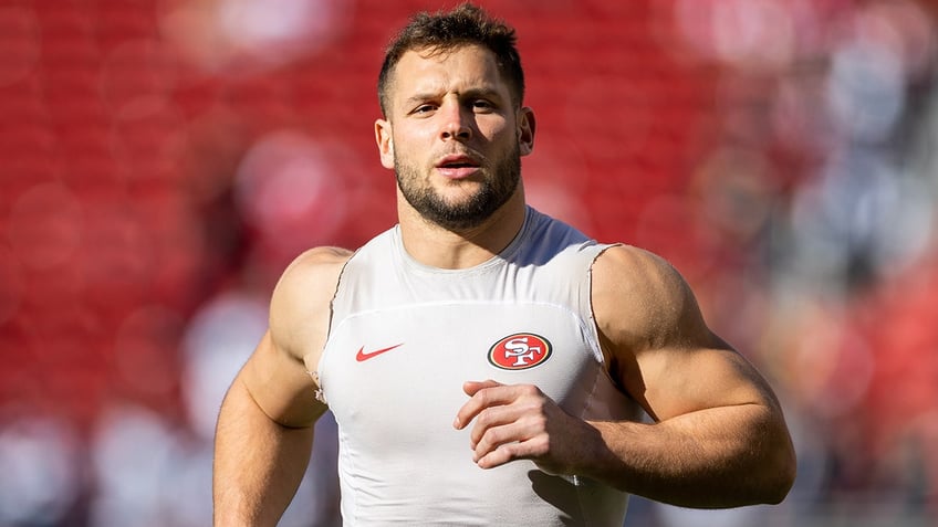 Nick Bosa warms up vs Cowboys