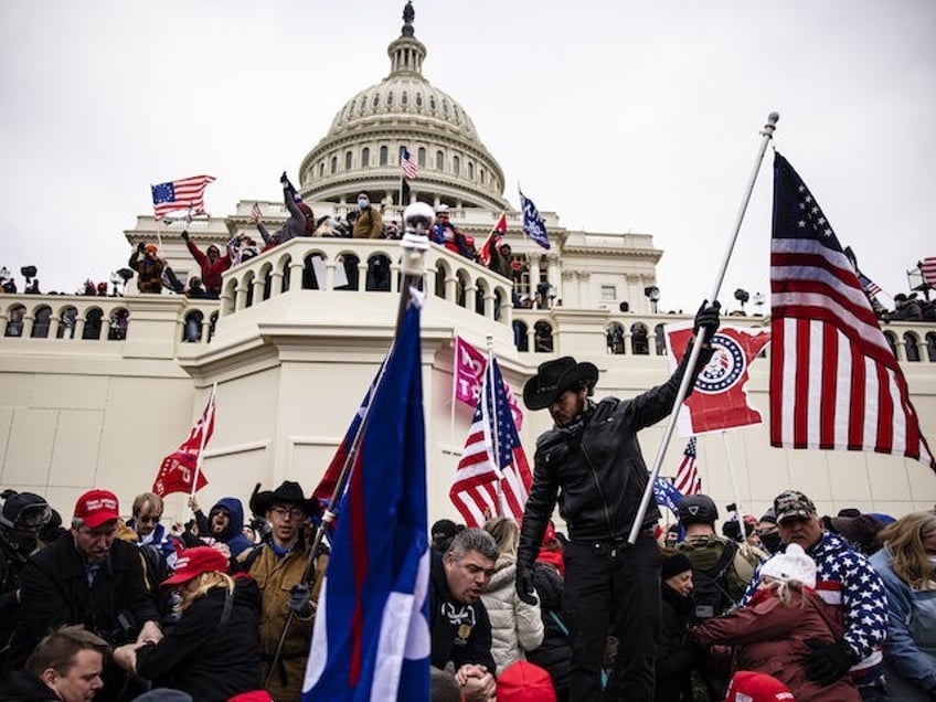 Pro-Trump supporters storm the US Capitol following a rally with President Donald Trump on