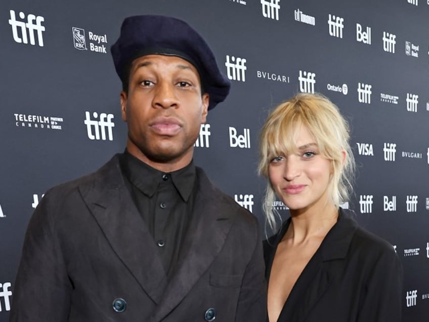 Jonathan Majors and guest Grace Jabbari attend the "Devotion" Premiere at Cinesphere on September 12, 2022 in Toronto, Ontario. (Photo by Matt Winkelmeyer/Getty Images)