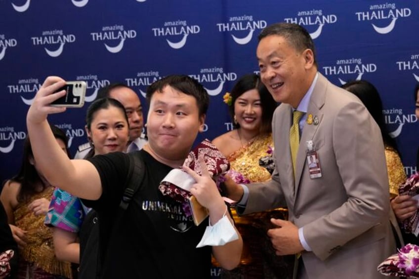 thailand receives the first chinese visitors under a new visa free policy to boost tourism