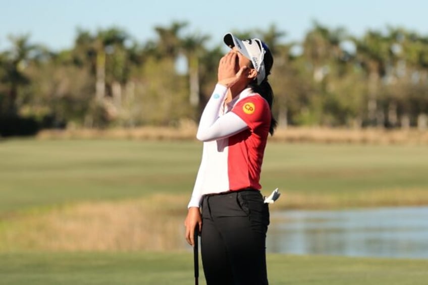 Jeeno Thitikul of Thailand reacts after making a putt for birdie on the 18th green to win