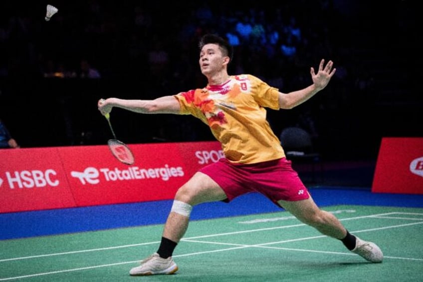 thailands kunlavut spills blood to win badminton world crown