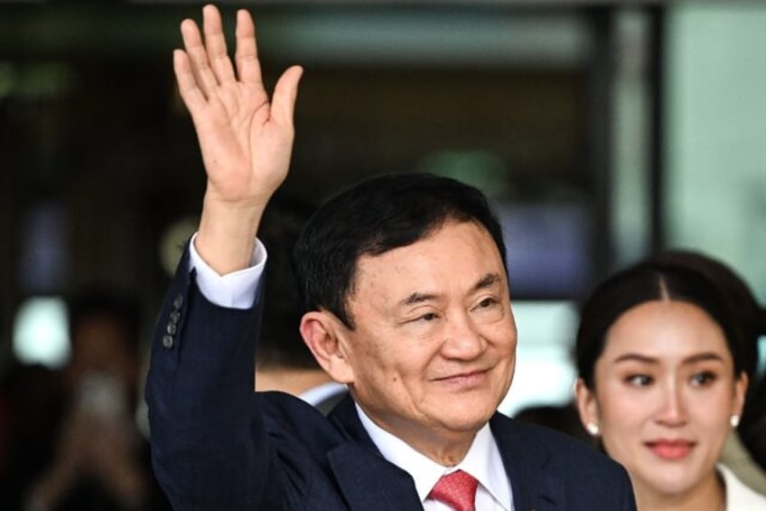 thailands thaksin moved to hospital after exile return