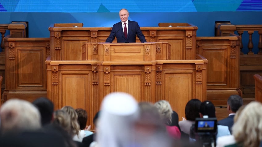 Russian President Vladimir Putin attends the Eurasian Women's Forum in Saint Petersburg, Russia September 18, 2024.  Sputnik/Grigory Sysoyev/Pool via REUTERS 