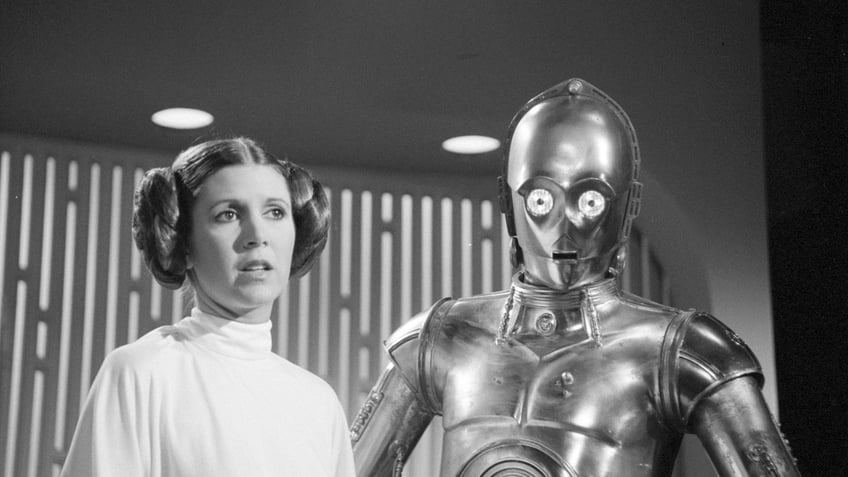 THE STAR WARS HOLIDAY SPECIAL. Carrie Fisher (as Princes Leia) and Anthony Daniels (as C3PO)