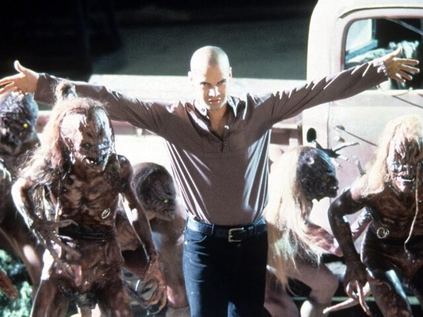 Billy Zane walking amongst identifiable creatures in a scene from the film 'Tales fro