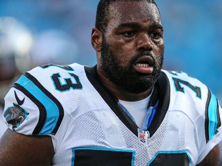 the blind side author michael lewis alleges michael oher turned down movie royalties