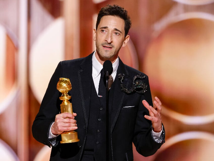 Adrien Brody accepts the award for Male Actor - Motion Picture - Drama at the 82nd Annual