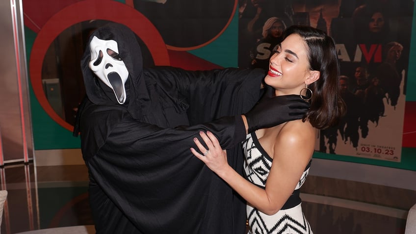 Melissa Barrera with Ghostface