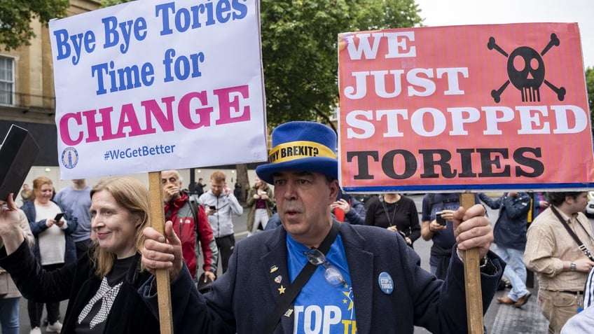 Protesters outside Downing Street on the day that the outgoing Conservatives are replaced by a Labour government, July 5, 2024, in London. (Mike Kemp/In Pictures via Getty Images)