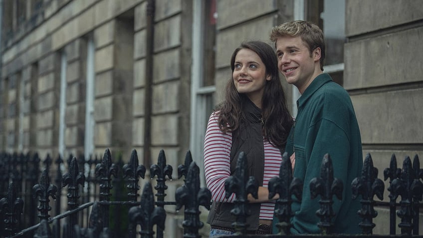 Meg Bellamy as Kate Middleton and Ed McVey as Prince William in "The Crown"