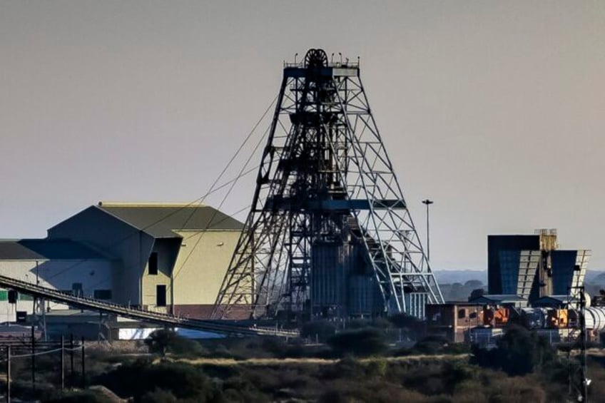 the death toll from a mining tragedy in south africa rises to 13 after a worker dies at a hospital