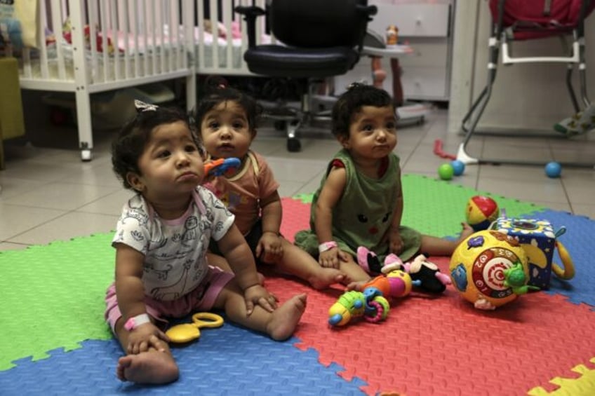 Palestinian triplets Najmeh, Najoua and Noor Bayouk have not seen their mother Hanane sinc