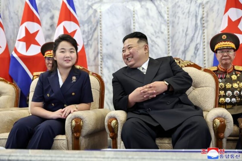 Recent signals indicate Kim Jong Un's daughter Ju Ae (L) could be in line to lead North Ko