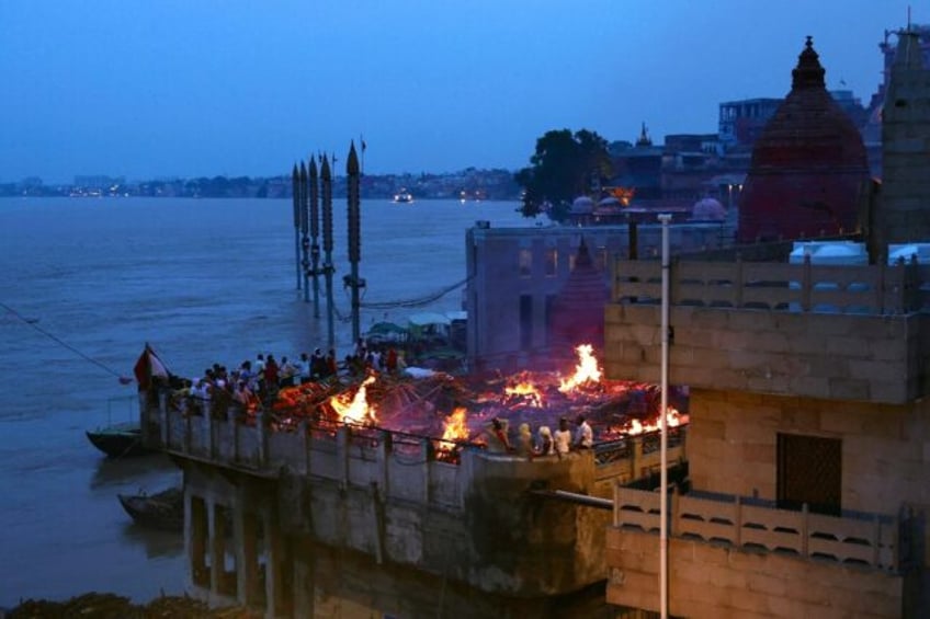 Funeral pyres line the Ganges river in India's holy city of Varanasi, where thousands come