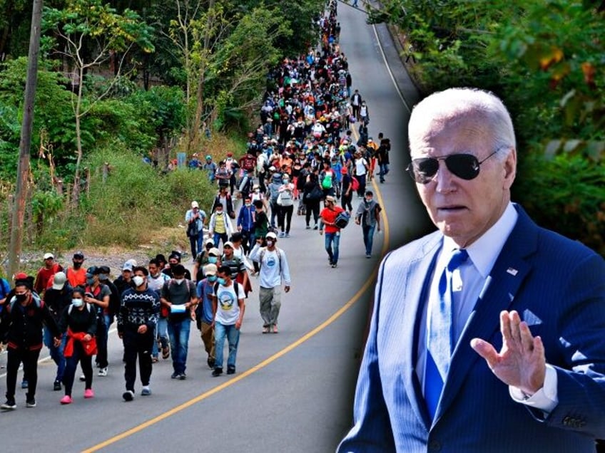 Honduran migrants, part of a caravan heading to the United States, walk along a road in Ca