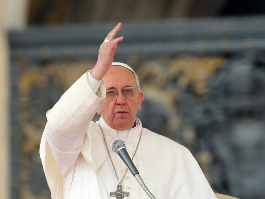 Pope Francis blesses the crowd during his first weekly general audience as pope on March 2