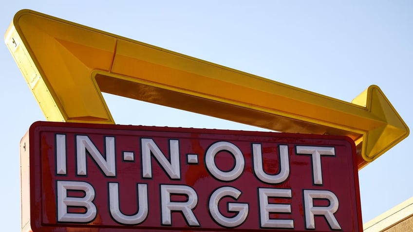 In-N-out Burger is shifting some corporate jobs to Tennessee. It's the latest company to move some of its corporate commitments out of California. FILE: The In-N-Out logo is seen near the restaurant in Los Angeles on November 13, 2023. (Photo by Jakub Porzycki/NurPhoto via Getty Images)