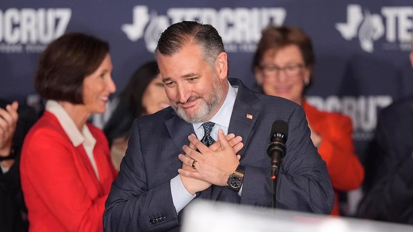 Ted Cruz shows his gratitude as he crosses his hands over his heart as he speaks at a watch party during the 2024 election