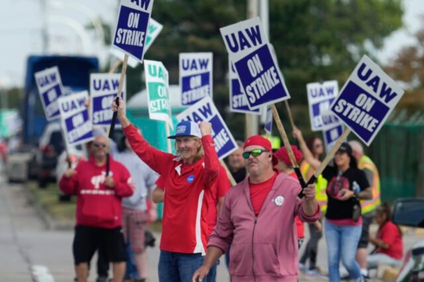 the strike by auto workers is entering its 4th day with no signs that a breakthrough is near